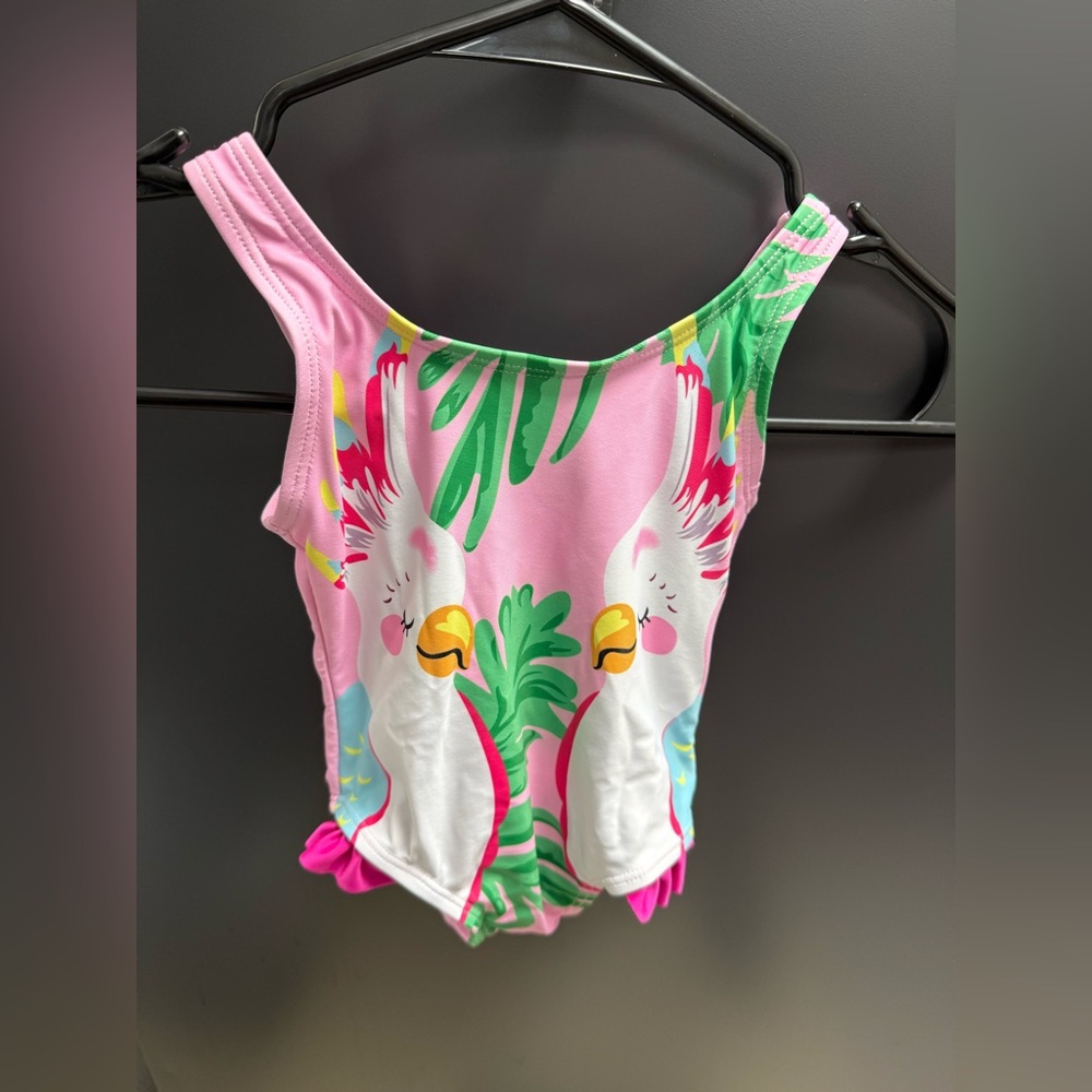 🌴 Pink Tropical Parrot One-Piece Swimsuit
Size: XS (Estimated 6–12 Months)